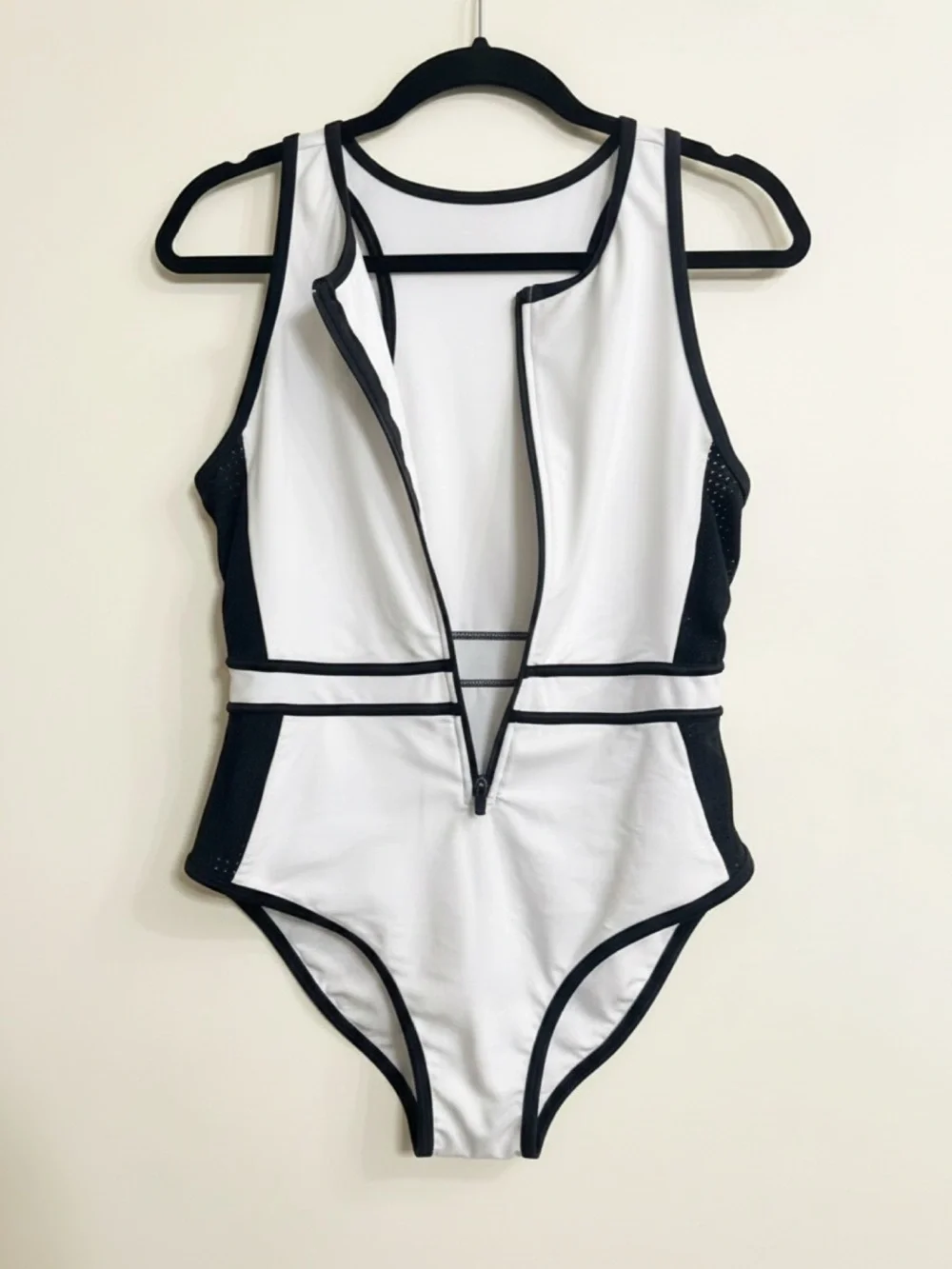 Woman’s White and Black Zip-Front One-Piece Swimsuit